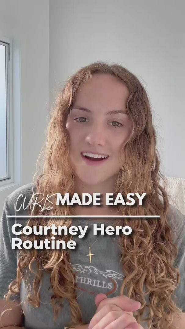 Load video: Courtney Hero Routine with an video of a light brunette wavy haired woman