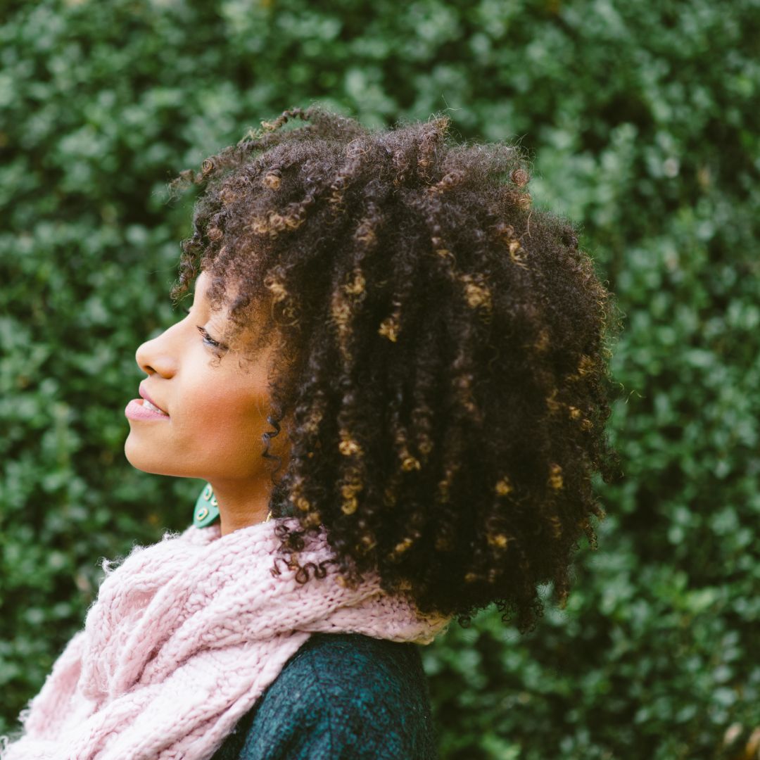 woman, curly brunette afro